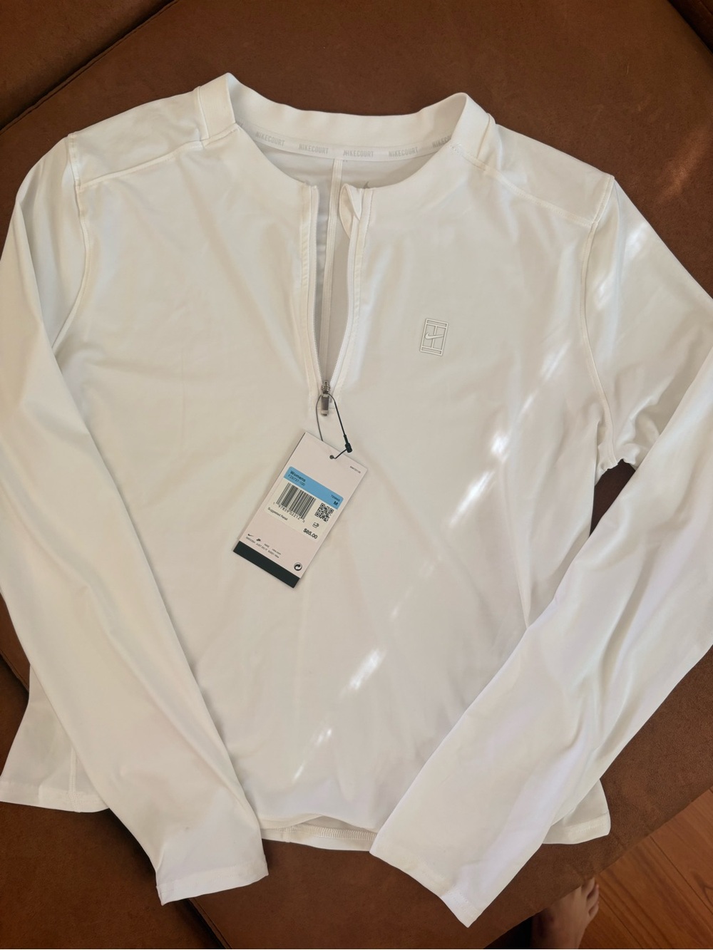 Woman’s White Long-Sleeve Zip-Front Performance Shirt